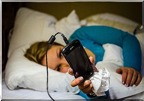 cell phone in bed