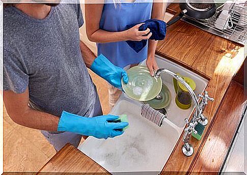 Couple washing cups