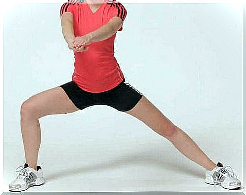 Woman making sideways lunges