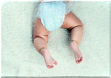 A baby with a diaper.